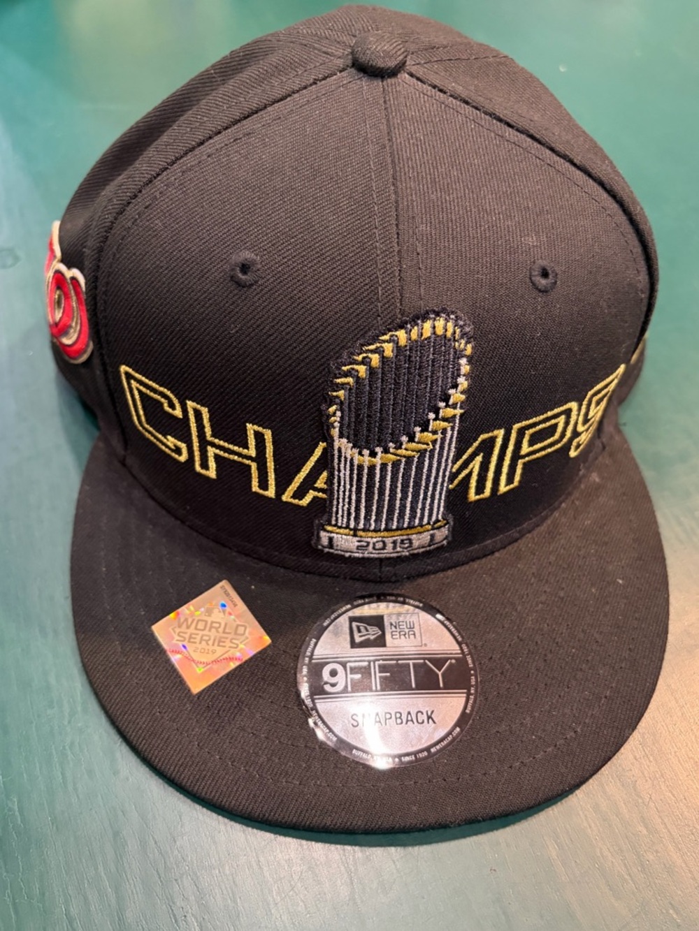 NWT/Stickers - New Era Black and Gold Nationals World Series Champ Snapback Hat